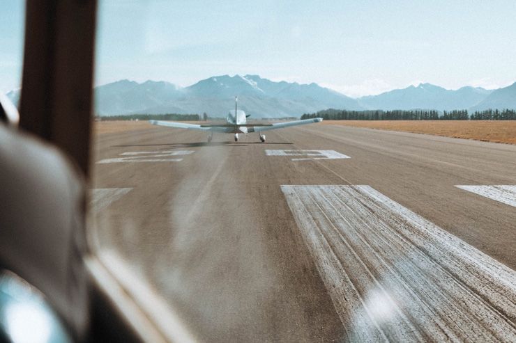 Wanaka Airport with small plane on runway